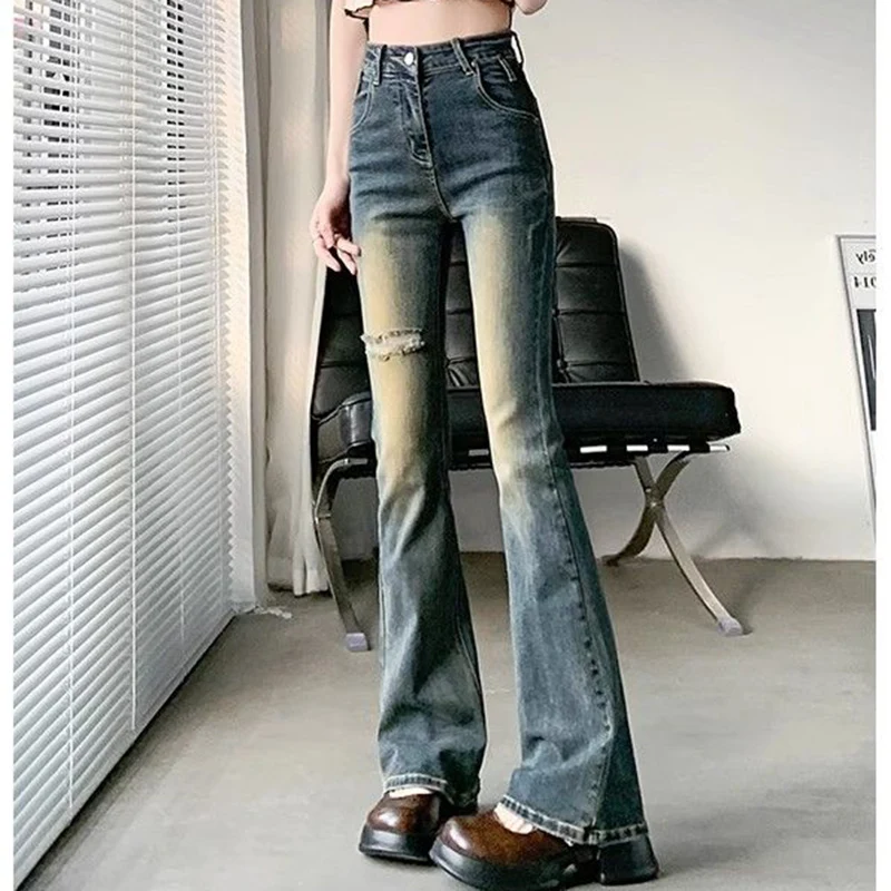 Jeans svasati strappati gotici a vita alta da donna Pantaloni con fondo a campana firmati femminili Pantaloni in denim da strada Y2k blu moda per ragazze