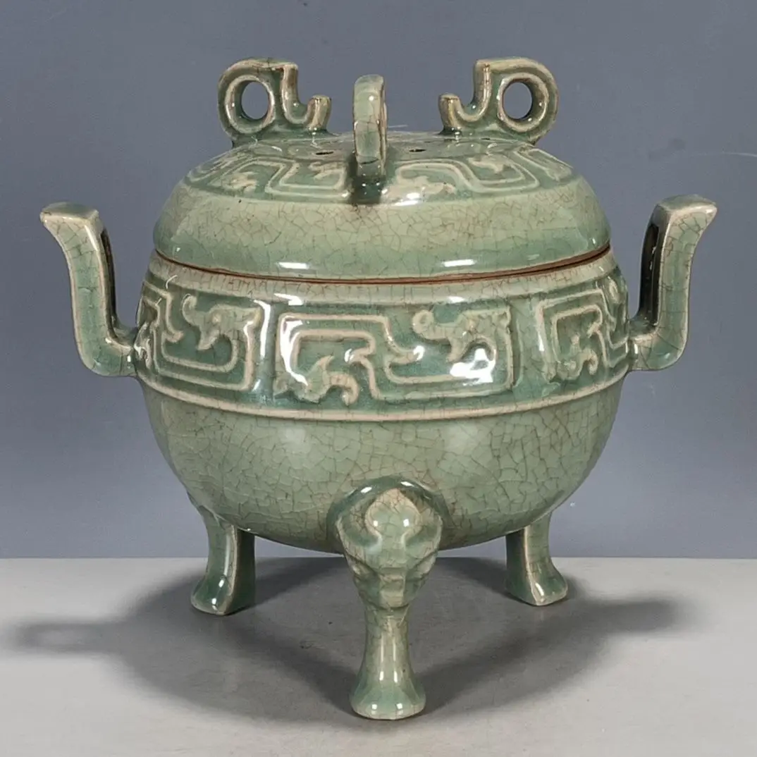 

Chinese antique porcelain Song Dynasty Ru porcelain Ru kiln three-legged double-eared furnace decorative artwork ornaments