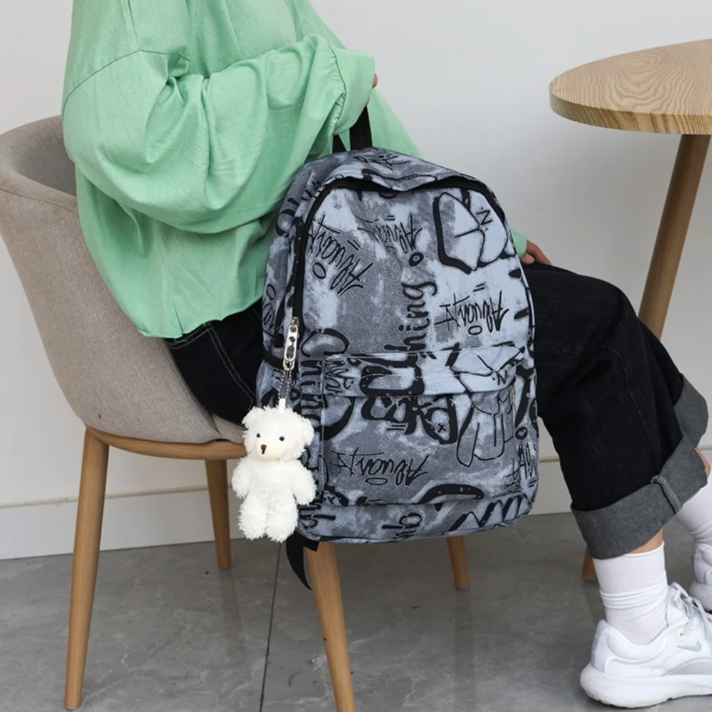 Sac à dos décontracté en nylon pour femme, grande capacité, sacs d'école étanches, sac initié par impression graffiti, étudiants