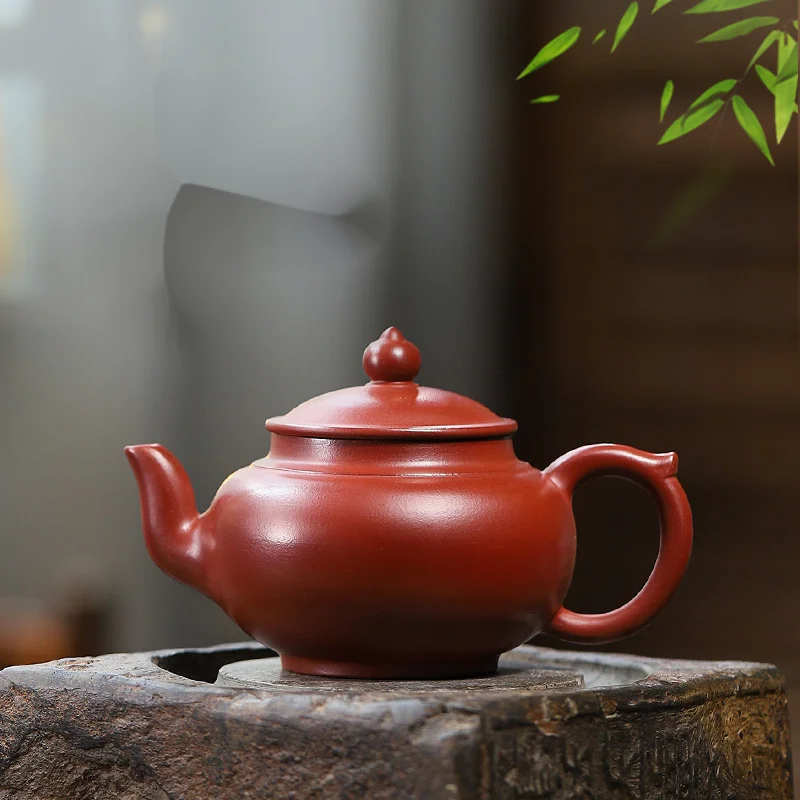 

Yixing Purple Clay Pot Pure Hand-made Tea Pot Kung Fu Tea Set Authentic Dahongpao Smile Cherry Pot 250cc