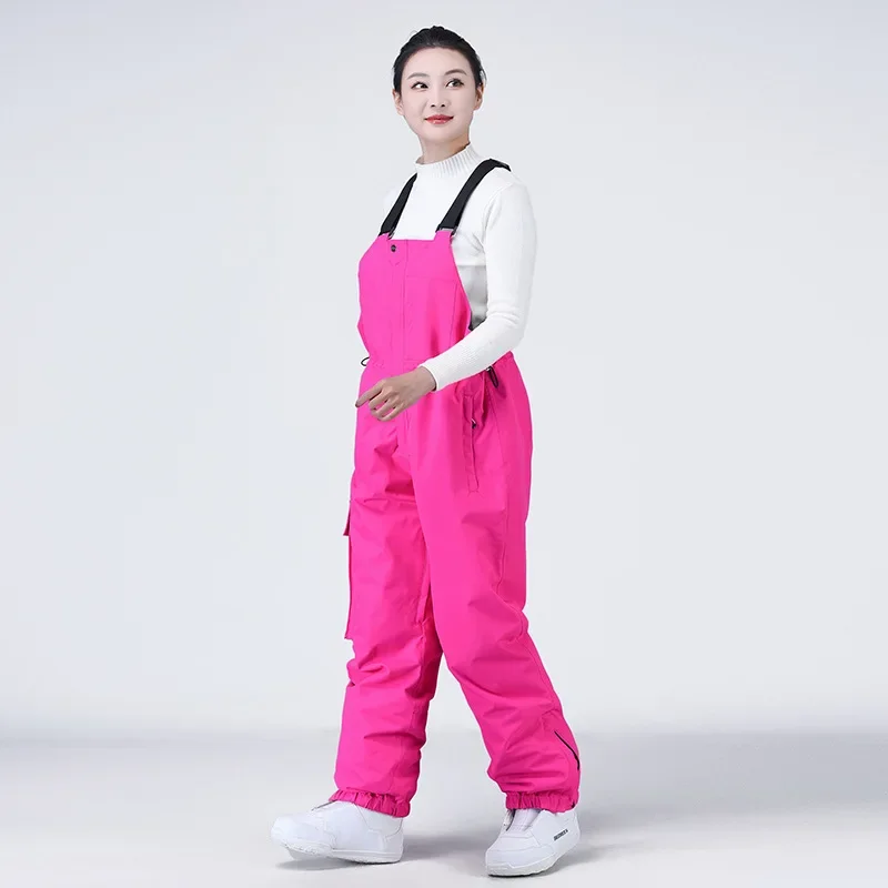 2025 neue solide Winter warme Outdoor Frauen Skihose wind dichte wasserdichte lose Skihose Polyester Sport Schnee Erwachsenen Overalls