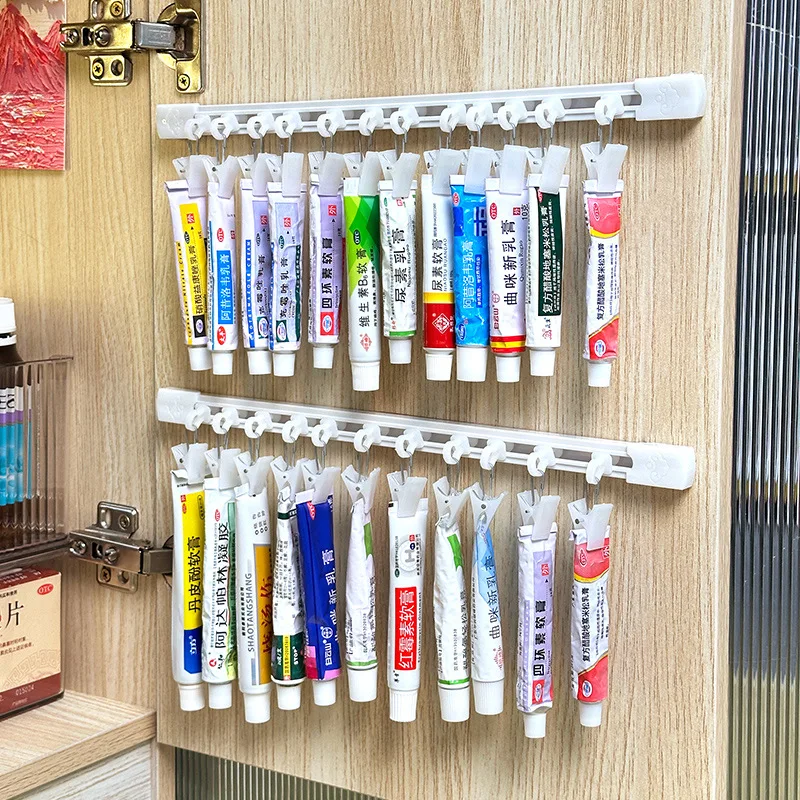 Creme-Aufbewahrungsregal, ohne Bohren, zum Aufhängen an der Wand, röhrenförmige cremefarbene Medikamenten-Gleitklemme, Aufbewahrungsregal für den Haushalt, Notfall-Medizin