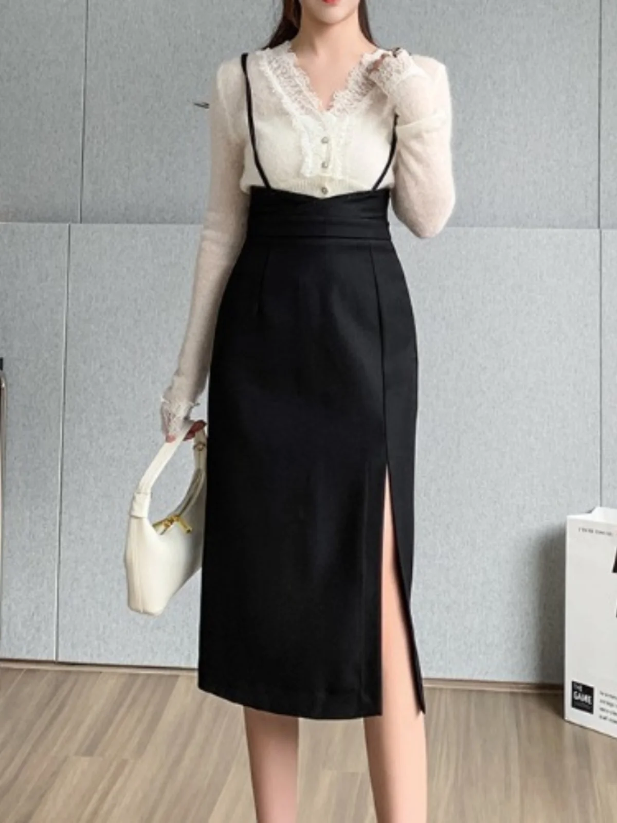 Strap skirt the new front fork black fashion pencil skirt