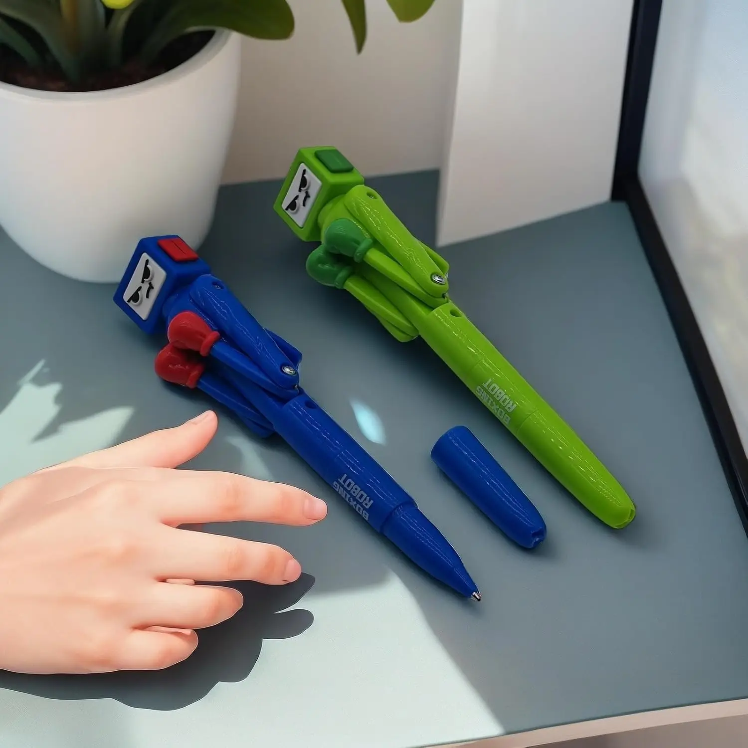 1/2/4 Stück Boxstift-Roboter mit Schlagarm und knackigem Tastenton – Lustiger, cooler Neuheitsstift – Boxgeschenke – Blau-Grün – Detail 4