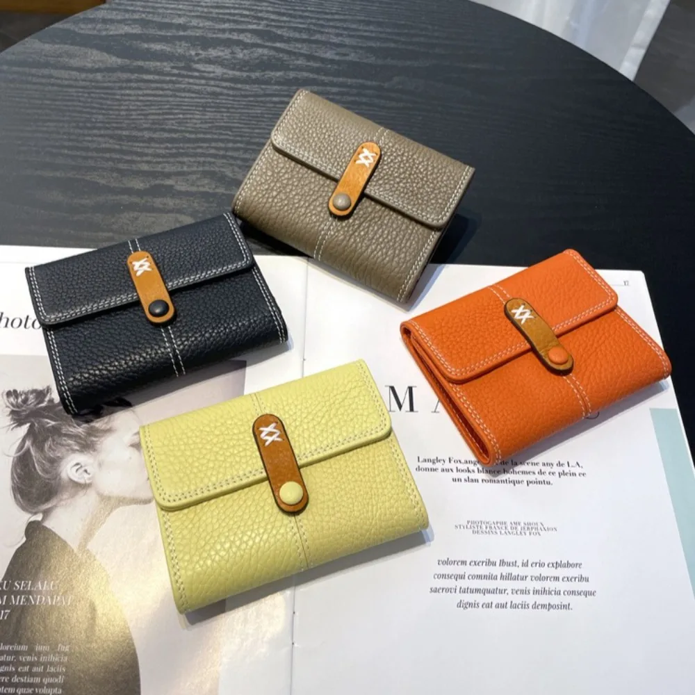 Real leather women's short purse with multiple card slots, large capacity, three-fold design, lightweight and colorful handbag