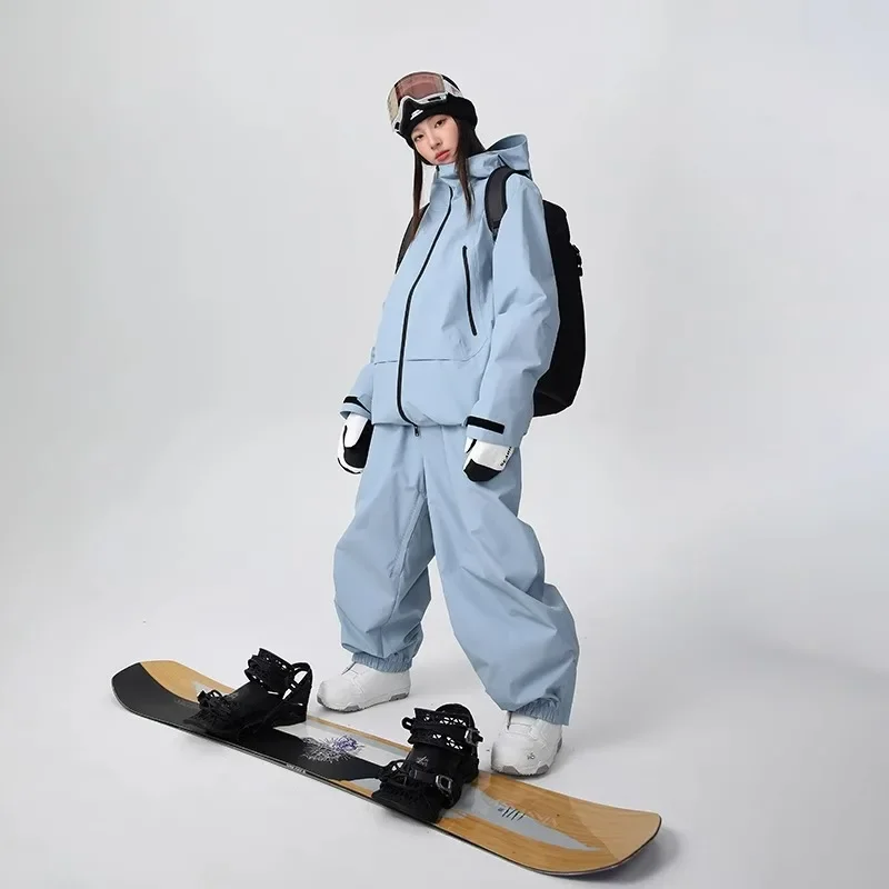 2025 Nuovo set da snowboard oversize donna caldo antivento impermeabile set di abbigliamento sportivo da uomo pantaloni da giacca da sci resistenti all'usura traspiranti