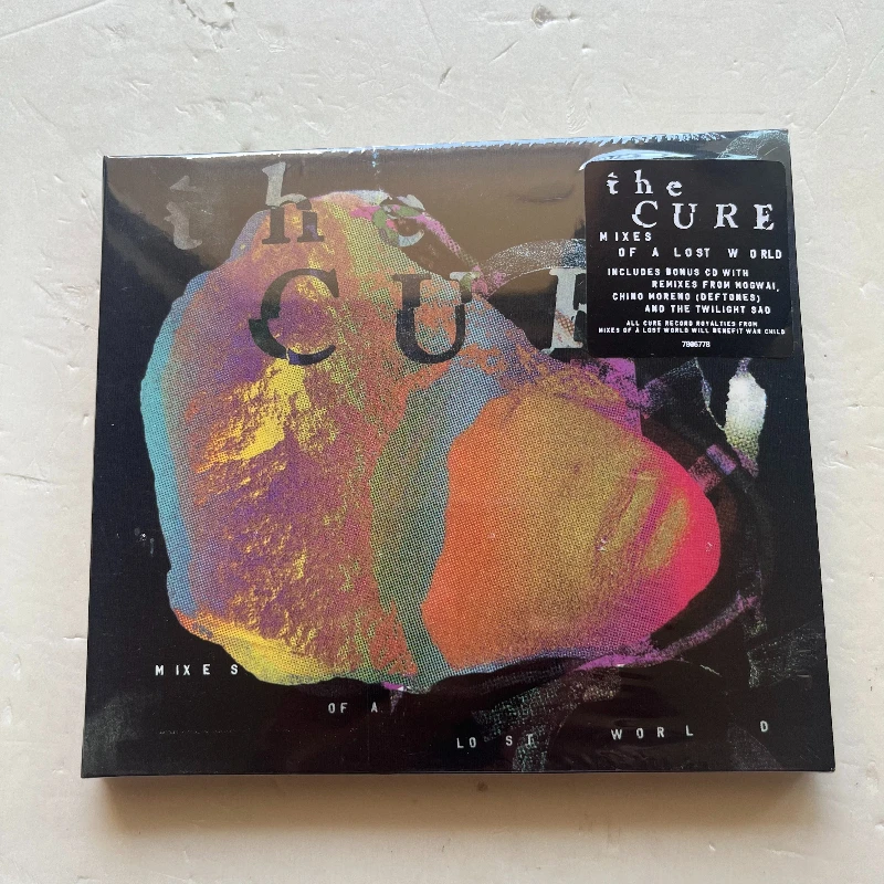 

Музыкальный компакт-диск The Cure Robert Smith, смешивает музыку потерянного мира, подарки