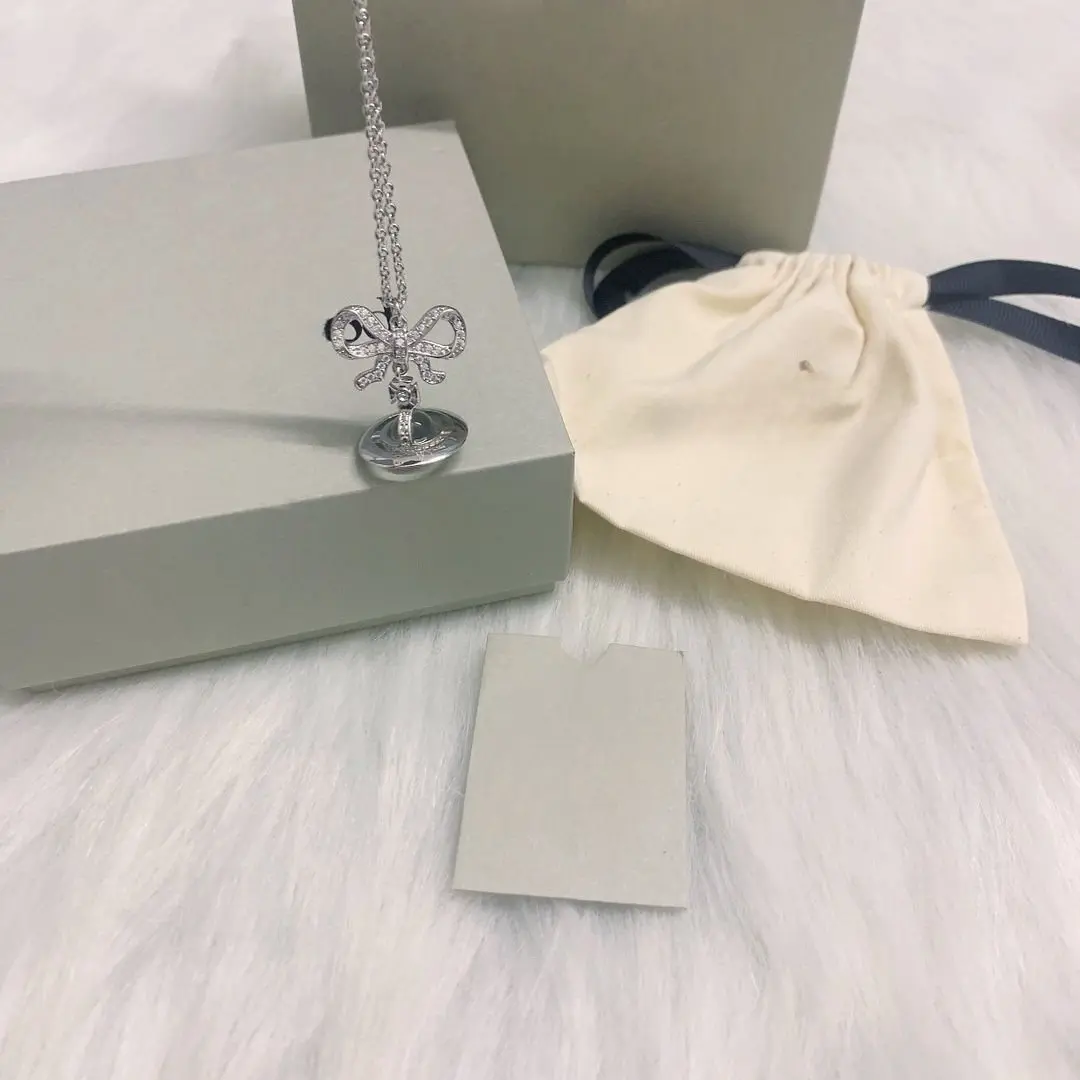 S925 فضة الأبيض ضوء القمر القوس ستيريو زحل قلادة قلادة السيدات أنيقة رومانسية الملحقات