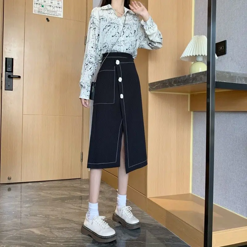 

Костюмная юбка для женщин с открытым разрезом. Юбка средней длины. Тонкая юбка трапециевидной формы большого размера.