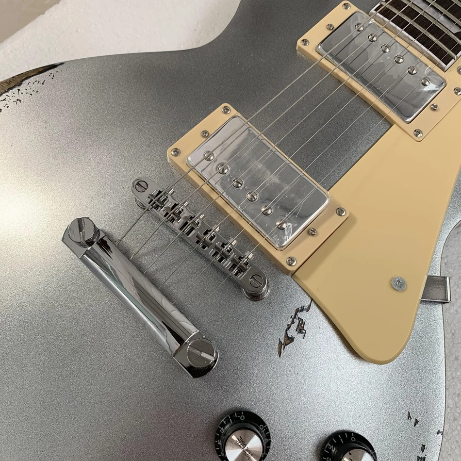 Metallic silver relic treated matte electric guitar, rosewood fingerboard