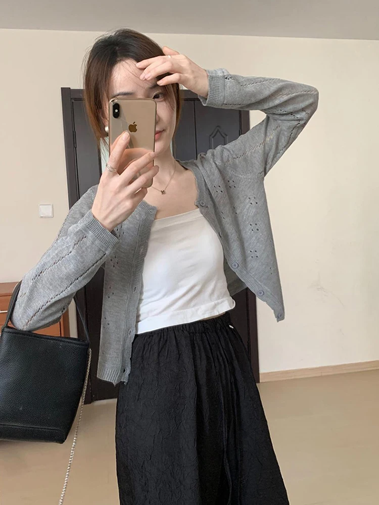 เสื้อคาร์ดิแกนถักแบบโปร่งสไตล์ฝรั่งเศส แขนยาว คอกลม ทรงหลวม แฟชั่นเรียบง่าย สไตล์ลำลอง สำหรับผู้หญิง ใส่แล้วดูผอมเพรียว เหมาะสำหรับฤดูใบไม้ร่วง