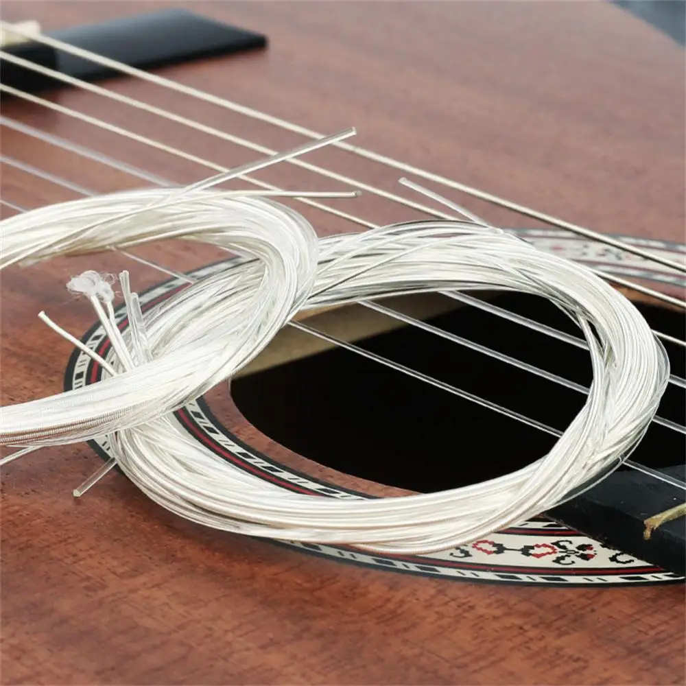 Cuerdas de guitarra de sonido nítido, accesorios de guitarra profesionales, instrumentos musicales versátiles Premium, venta al por mayor, fácil de instalar