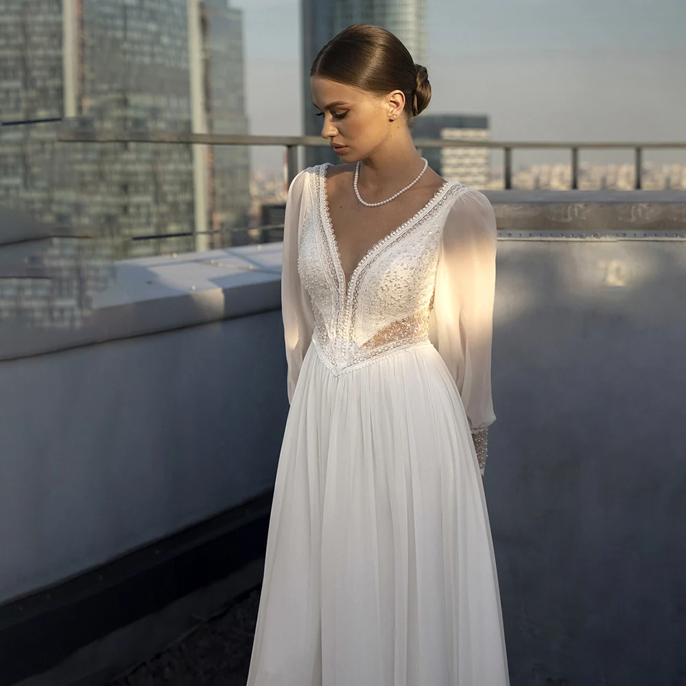 Suknie ślubne z długimi, biskupimi rękawami, seksownym rozcięciem na udzie, do połowy uda, szyte na miarę, z miękkiego szyfonu, z dekoltem w serek, zdobione koralikami, z wycięciami, eleganckie suknie ślubne.