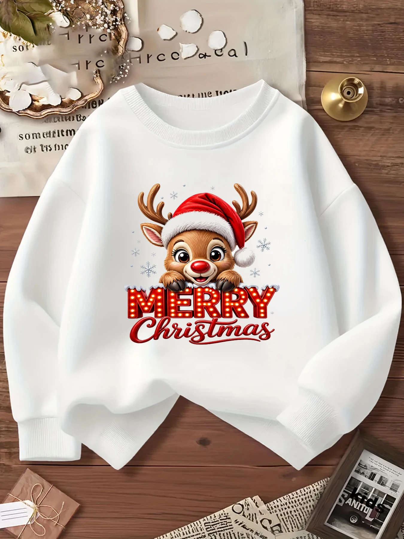 Versatile Christmas party sweatshirt—a festive reindeer pullover perfect for setting the mood at kindergarten Christmas events.