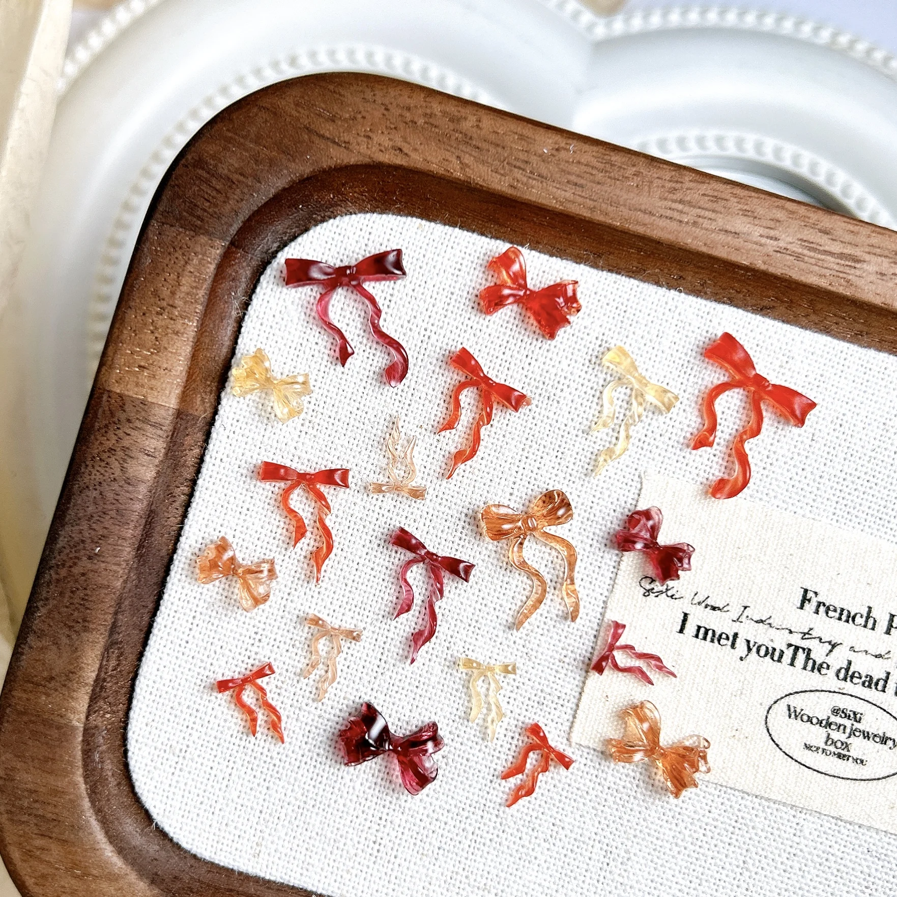 50PCS Novelty Creative Jelly Bow Resin Nail Charms Transparent Four-colors Wave Bow Tie Nail Art Decorations for DIY Sweet Nails