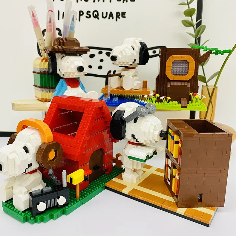 Rest Snoopy Micro bloques de construcción música pesca Snoopy portalápices modelo 3D lindo rompecabezas Mini ladrillos figura juguetes para regalo de cumpleaños