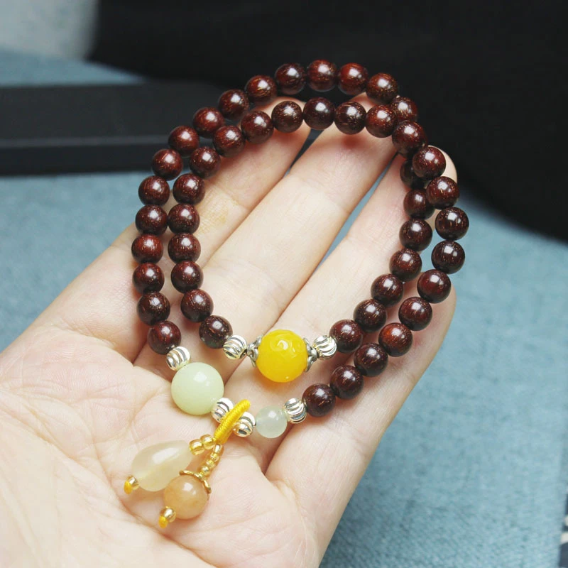 

Браслет Zambian Golden Star 0.6 мм с аксессуарами из камней весенних оттенков, бусины для медитации из розового дерева и кровавого сандала