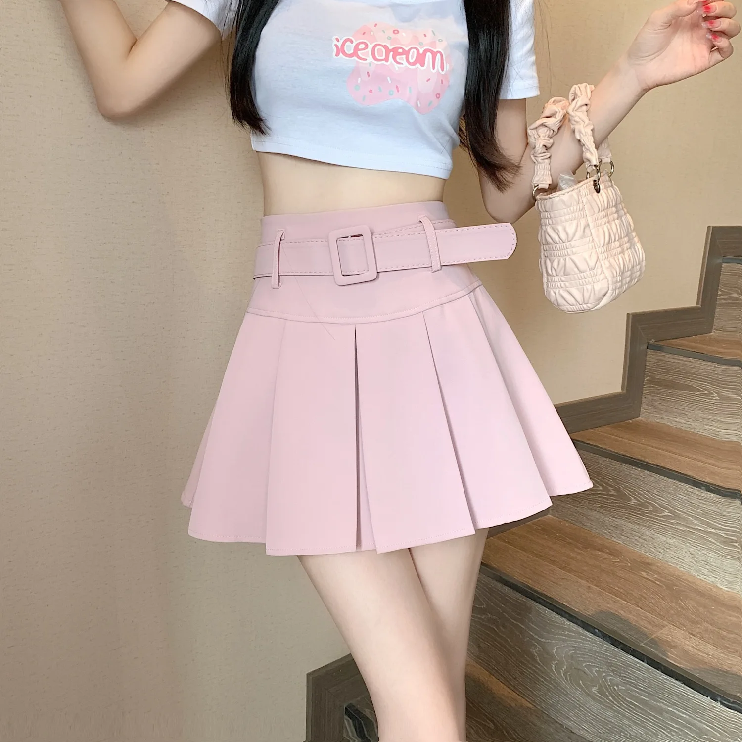 Wedbleser media falda rosa plisada verano 2025 nueva cintura alta adelgazante A-line dulce picante estilo universitario faldas cortas que abrazan la cadera