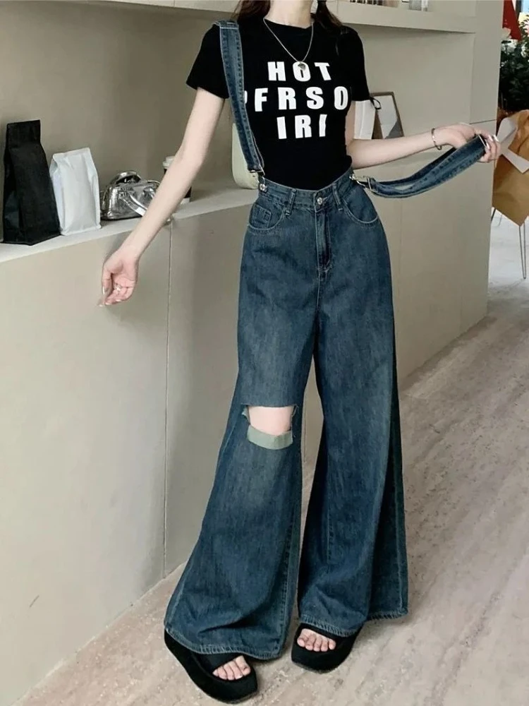 

Летние джинсовые комбинезоны 2026 для женщин в корейском стиле: рваные, с высокой талией, свободного кроя, универсальные, с широкими штанинами, для создания стройного силуэта