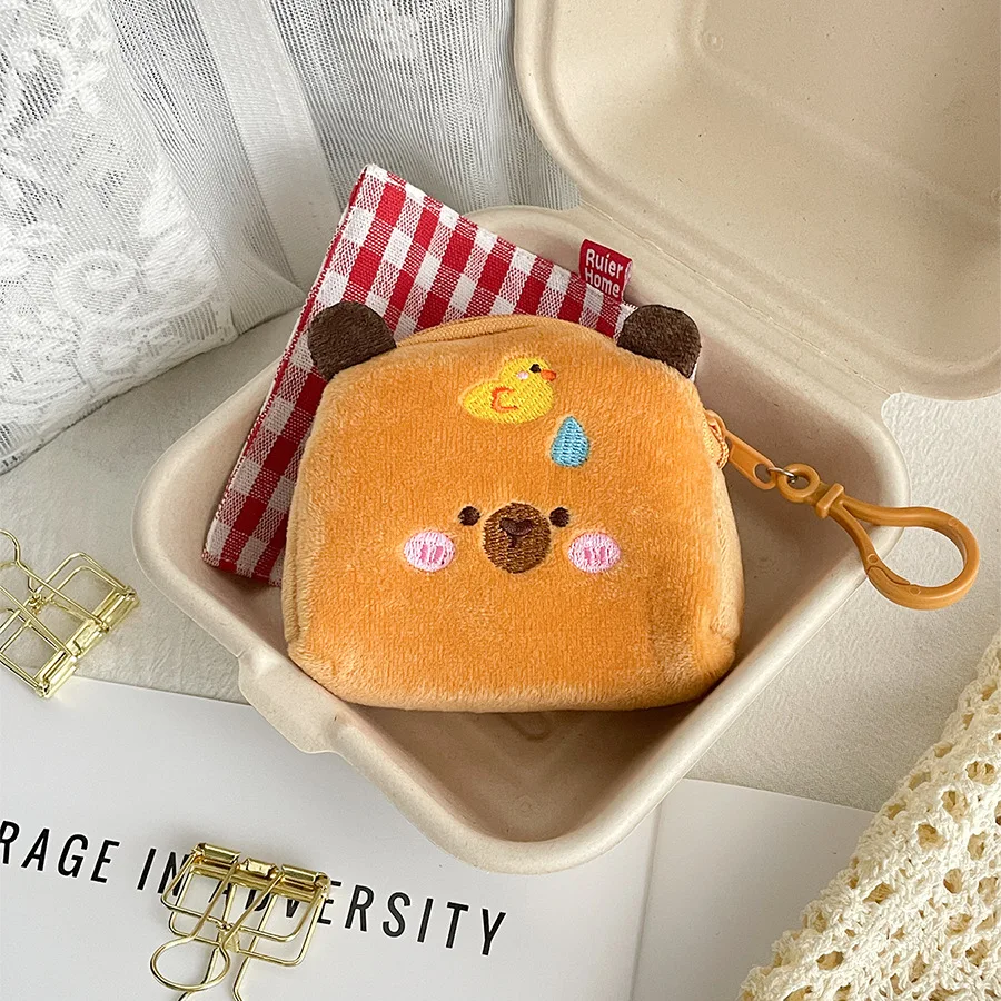 Nouveau créatif Capybara Anime en peluche porte-monnaie belle bande dessinée Capybara en peluche portefeuille fille casque sac de rangement enfants cadeau