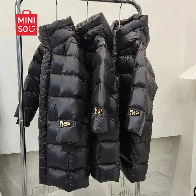 سترات MINISO للخريف والشتاء للأولاد والبنات 25 سترات طويلة جديدة للأطفال في منتصف وكبار السن باللونين الأسود والذهبي