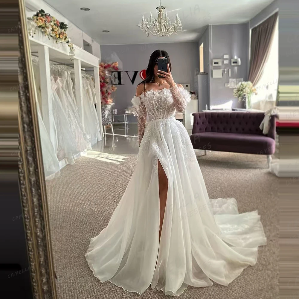 فساتين زفاف فاخرة بخط لامع يزين تول فساتين زفاف نسائية مخصصة طويلة الأكمام قبالة الكتف Vestidos De Novia