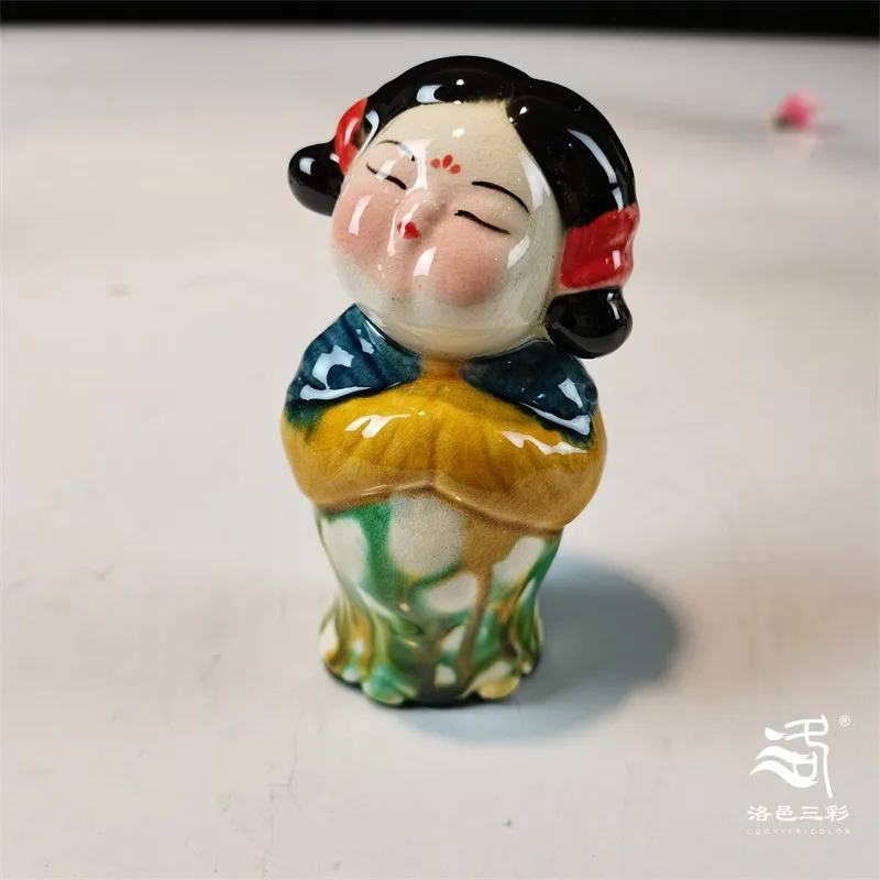 

Three-color ceramic Tang Xiaoniu Museum merchandise healing figure ornament