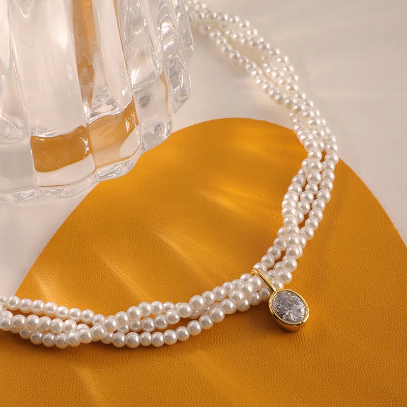 Vintage multi-layer geometric pearl necklace fashion light luxury collarbone chain senior sense temperament collar