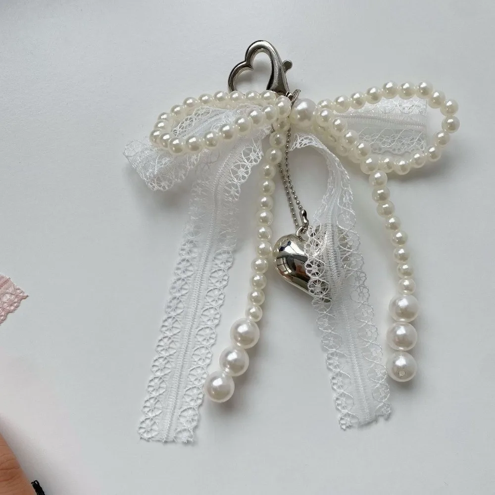 Einfacher Schleifenanhänger aus Legierung, Spitze, Kunststoffperle, Schlüsselanhänger, weiße geflochtene Kette, hängender Schlüsselring, Auto – Detail 10