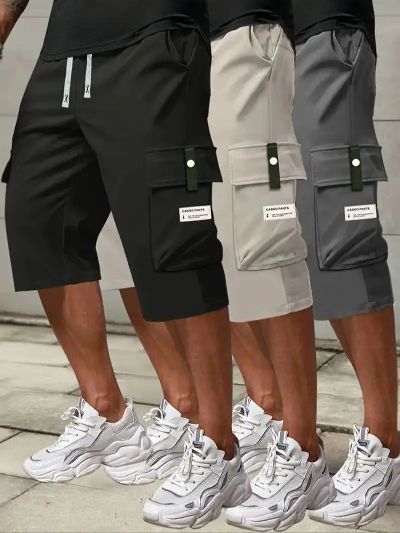 

Мужские повседневные однотонные брюки из полиэстера 7/8, средняя талия, большой карман, нашивка с буквами, модные, для отдыха, спортивные брюки для повседневного использования