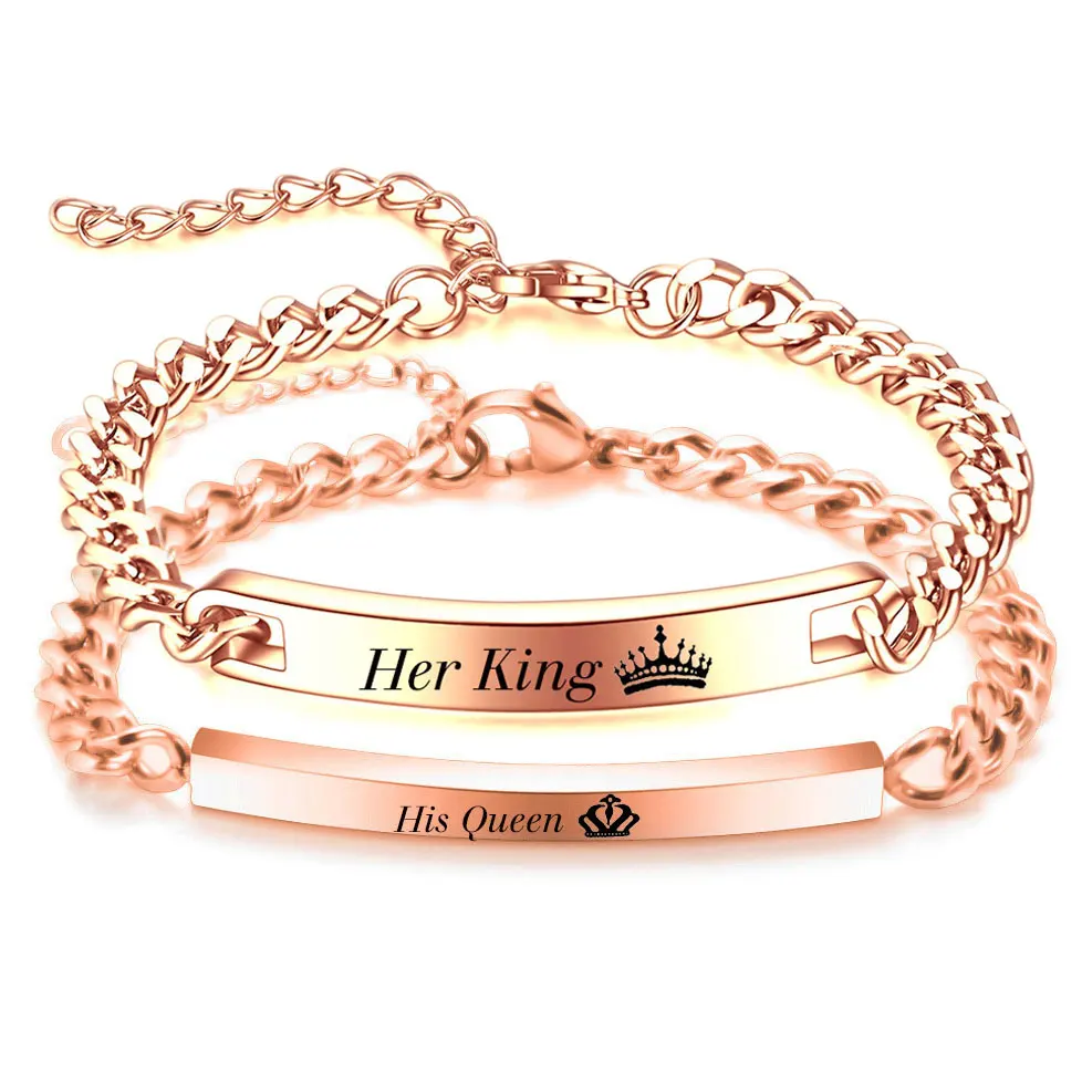 A pair of 7MM smooth stainless steel couple personalized bracelets with crown and lucky slogan