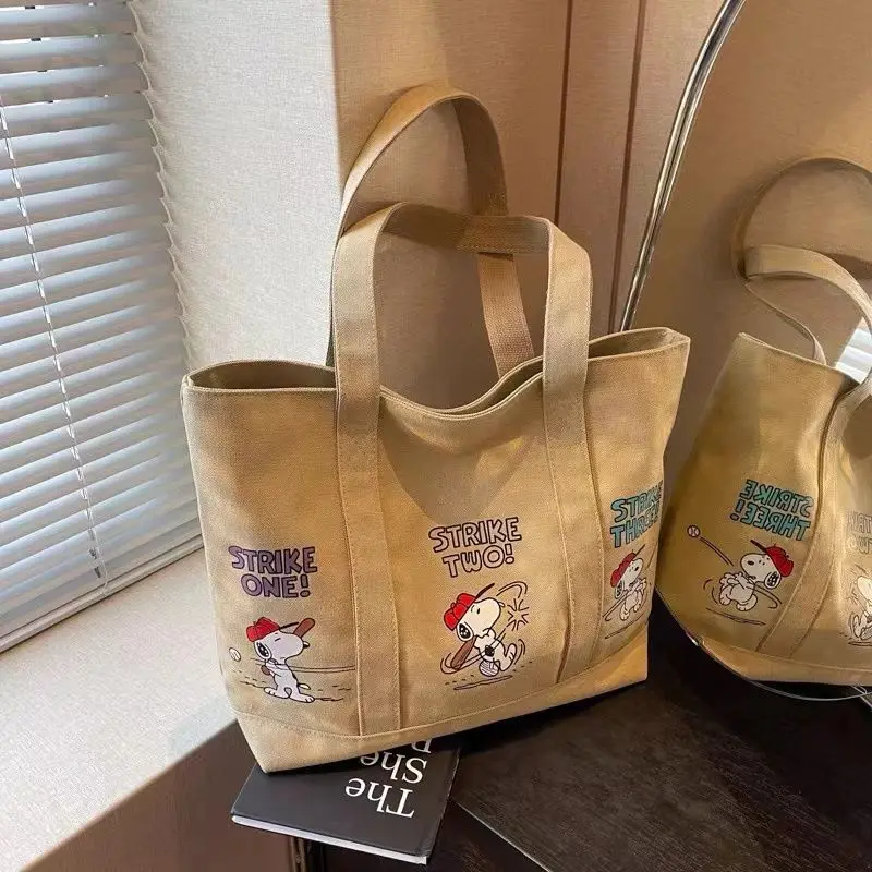 Neue Cartoon Snoopy Canvas-Tasche Modische Beliebte Damen-Schultertasche Zurück-zur-Schule-Saison Studenten-Handtasche Lässige Reisetasche