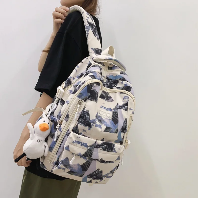 Bolsa de libros con estampado para mujer y hombre, morral escolar con grafiti para ordenador portátil, mochila de viaje para Universidad, a la moda, novedad