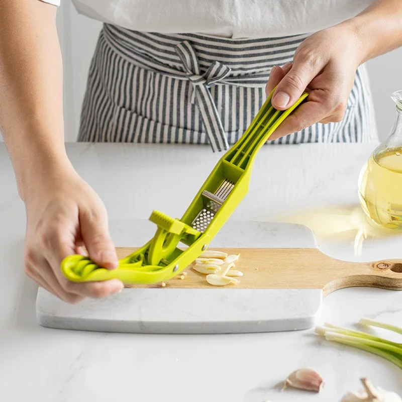 

2-in-1 Multifunctional Garlic Press Mash & Slice Garlic vegetables Home Cooking Squeezer For Home Cooking Masher Tool