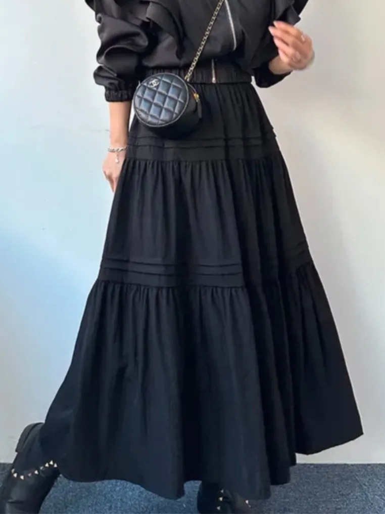 Elegancka spódnica midi o kroju litery A z wysokim stanem, wyszczuplająca, uniwersalna, plisowana, łączona, o długości do połowy łydki, w stylu koreańskim, idealna do pracy.