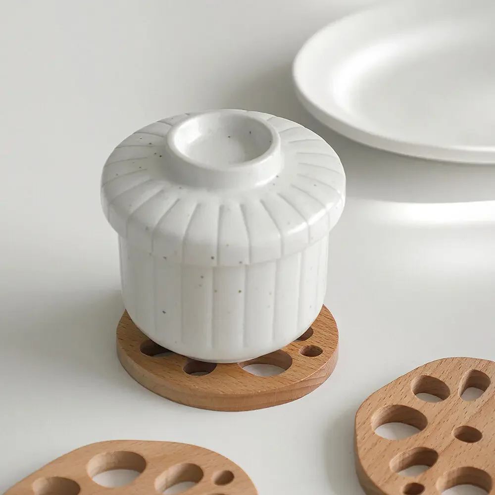 Log lotus root slices, chopstick rack, tableware rack, heat insulation pad, chopstick holder, spoon, wooden coaster