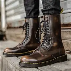 Botas clásicas de cuero liso para hombre y mujer, zapatos de estilo Martins de talla grande, impermeables, de piel negra, de alta calidad, para invierno