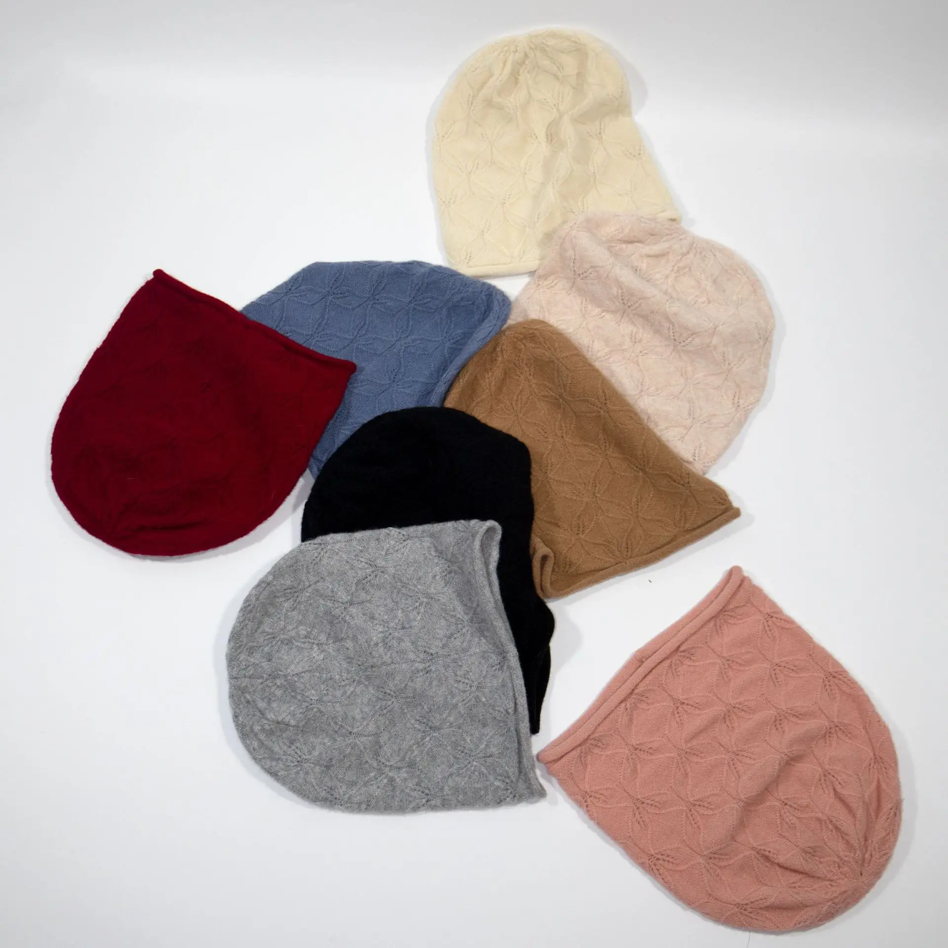 ピュアウールロールアップニット帽子ハガートークキャップストッキングヘッドウォッチ女性中空キャップアートティック8M74