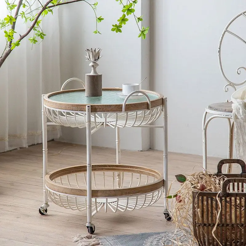 Side few carts, small coffee table mobile with wheels, small round table on the second floor of the restaurant