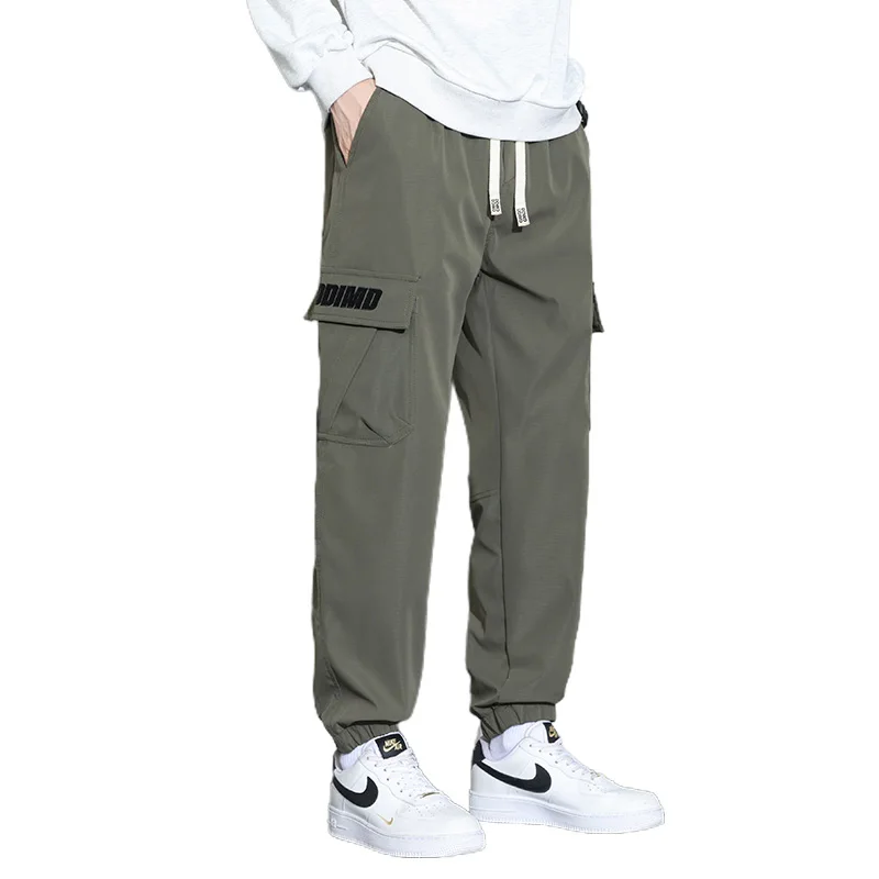 

Spring Autumn New Solid Color Fashion Elastic Waist Cargo Trousers Man High Street Casual Pockets Drawstring Ankle Length Pants