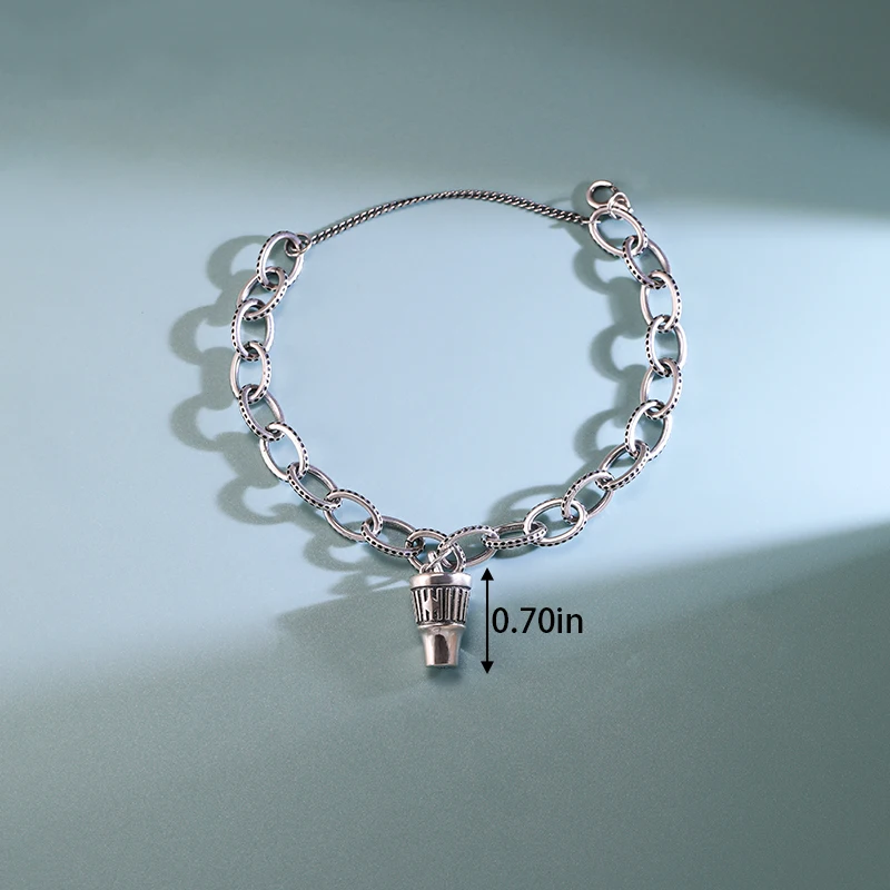 

Genuine 925 sterling silver James Avery Textured Oval Charm Bracelet paired with an Enamel Whataburger® cup pendant