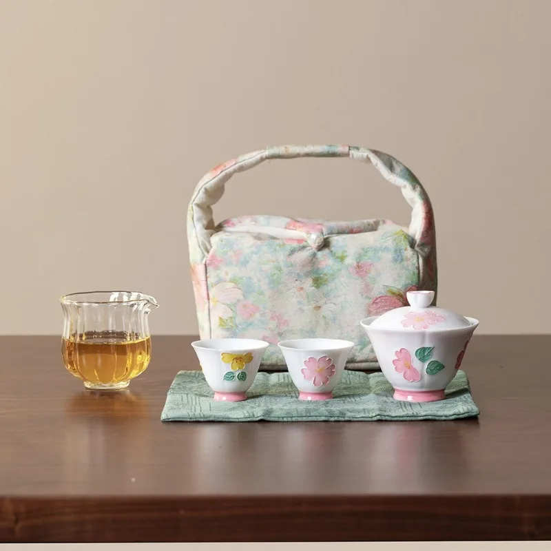 

Pure hand-painted pink flower cover bowl two-cup set outdoor portable tea bag complete set of kung fu tea set as a gift