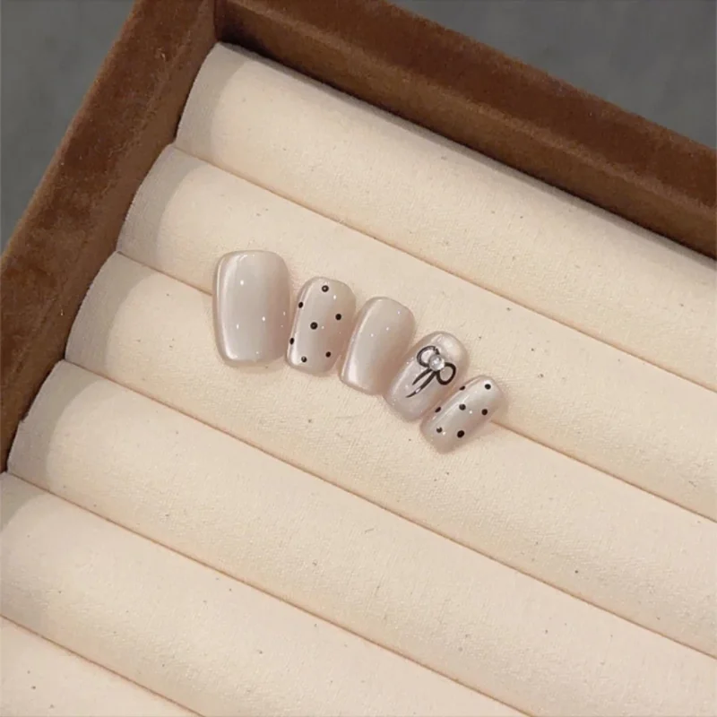 

Nude Elegant Handmade Press on Nails Cat Eye With Bow Design Reusable Wearable Fake Nails Full Cover Nail Tips More Short Coffin