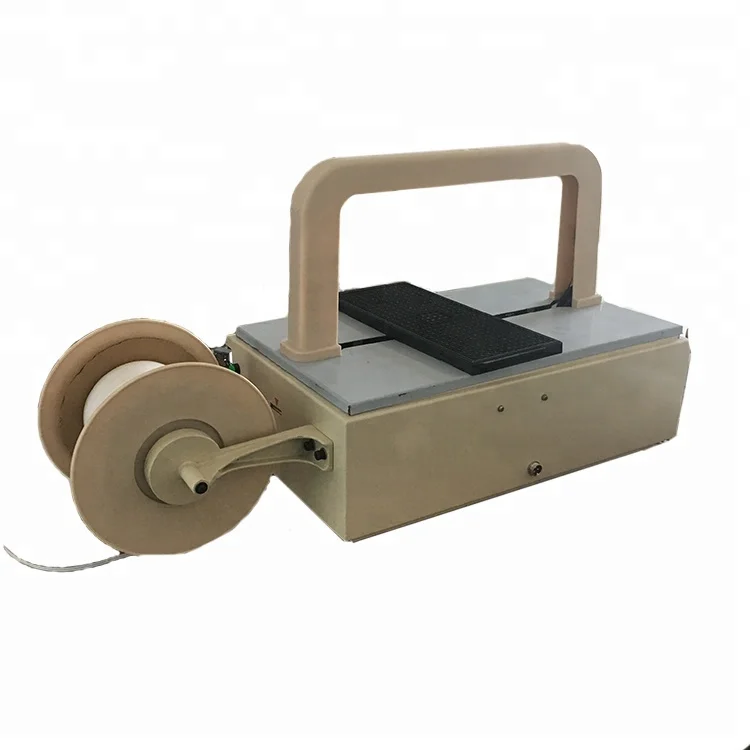 Portable plastic tray automatic packaging machine with packing belt