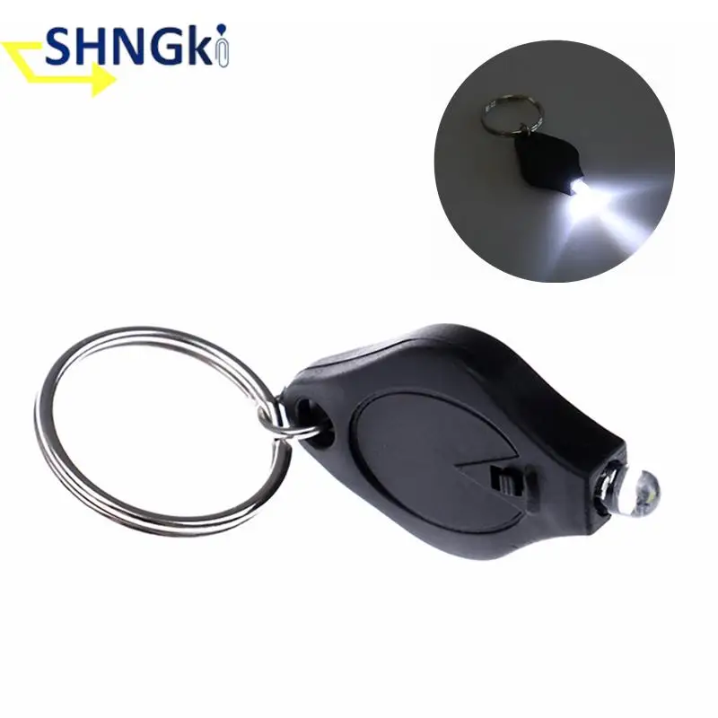 1xOutdoor Camping Emergency Key Ring Light LED Mini Key Chain Light Squeeze Light Micro Flashlight Torch Built-in CR2016 Battery