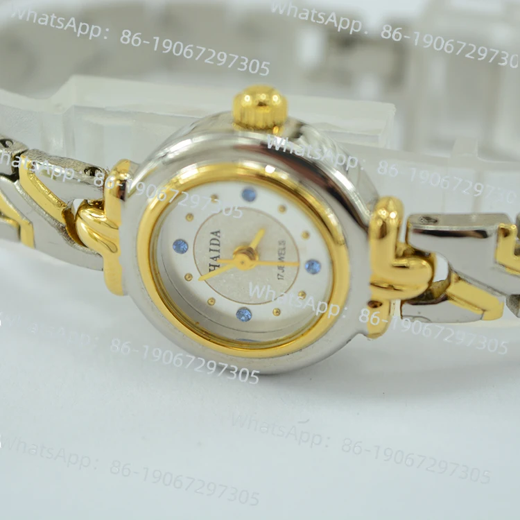 

Shanghai Third Factory Laohaida Brand Простые и модные круглые золотые механические женские часы с ручным управлением