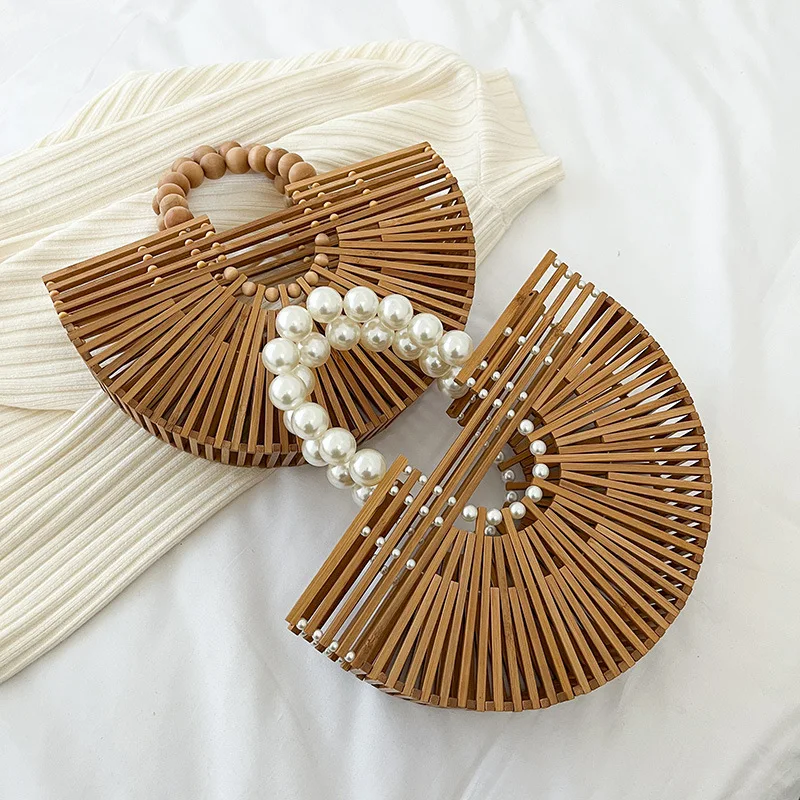 

Handwoven handbag New Pearl Handheld Beach Bag Hollow half round bamboo woven bag Fashion vacation bag