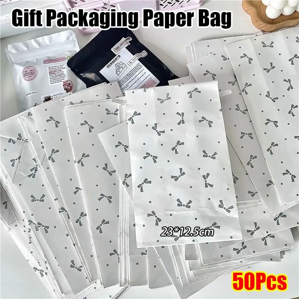 50Pcs Durable Card Out Paper Wrapping Bags Kraft Paper Silver Hot Stamping Paper Bag Simple Bow Gift Packaging Bag