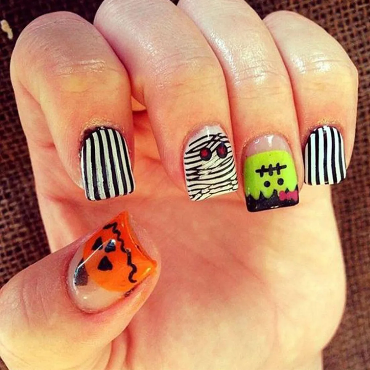 

Extra Short Press on Nails Halloween Nails Square Fake Nails Orange Black False Nails with Pumpkin Designs Glitter Acrylic Nails