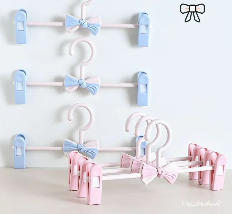 

10pcs Set Kids's Bow Clothes Hanger Racks Portable Plastic Display Hangers Windproof Children Coats Hanger Baby Clothing Organiz